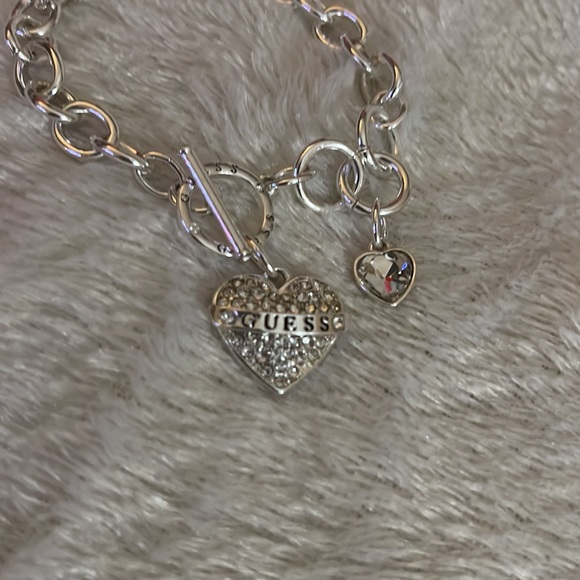 GUESS Women's Silvertone Chain Toggle Dangle Heart Charm Bracelet - Picture 3 of 6